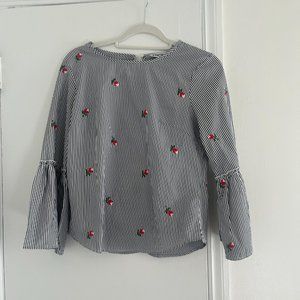 Striped shirt with embroidered flowers